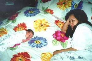 on the big bed, about 2 weeks old
